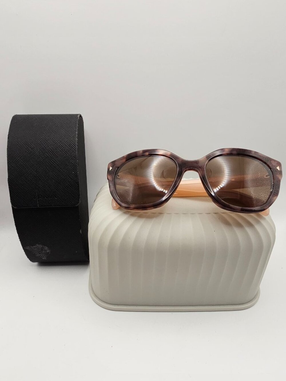 Prada SPR 12S PR 12ZS U6O‑4K0 Mogano Mahogany Tortoiseshell Cat‑Eye Sunglasses